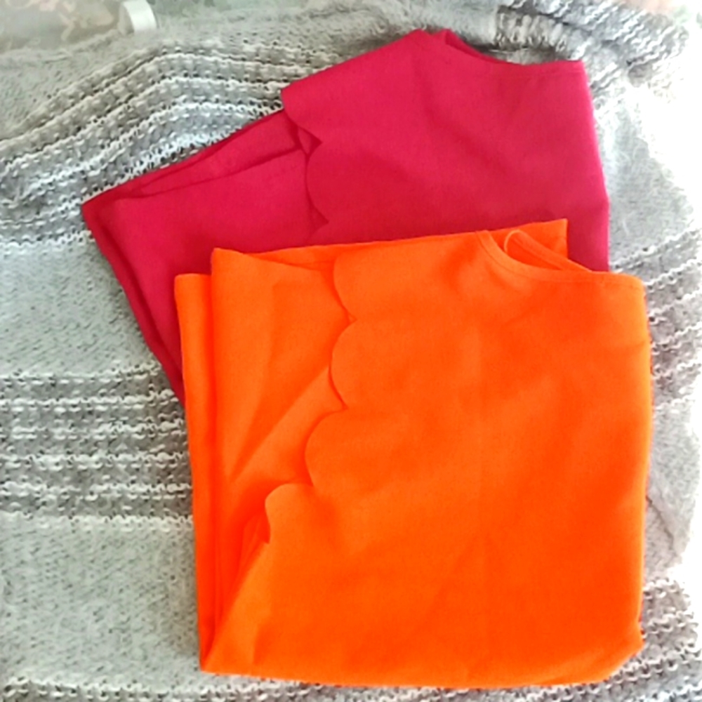 2 sleeveless blouses